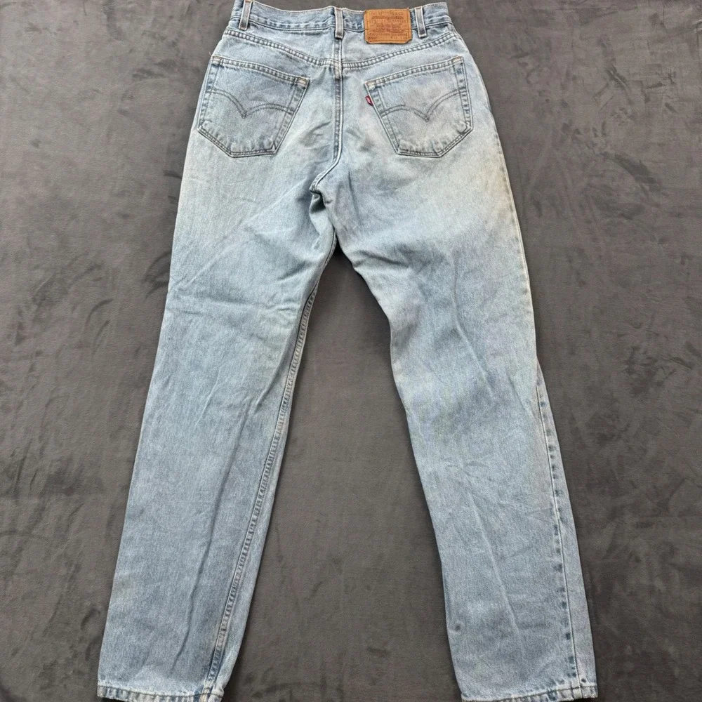 Vintage Levis 550 Relaxed Fit Jeans Light Wash Made in USA 33x34 Distressed